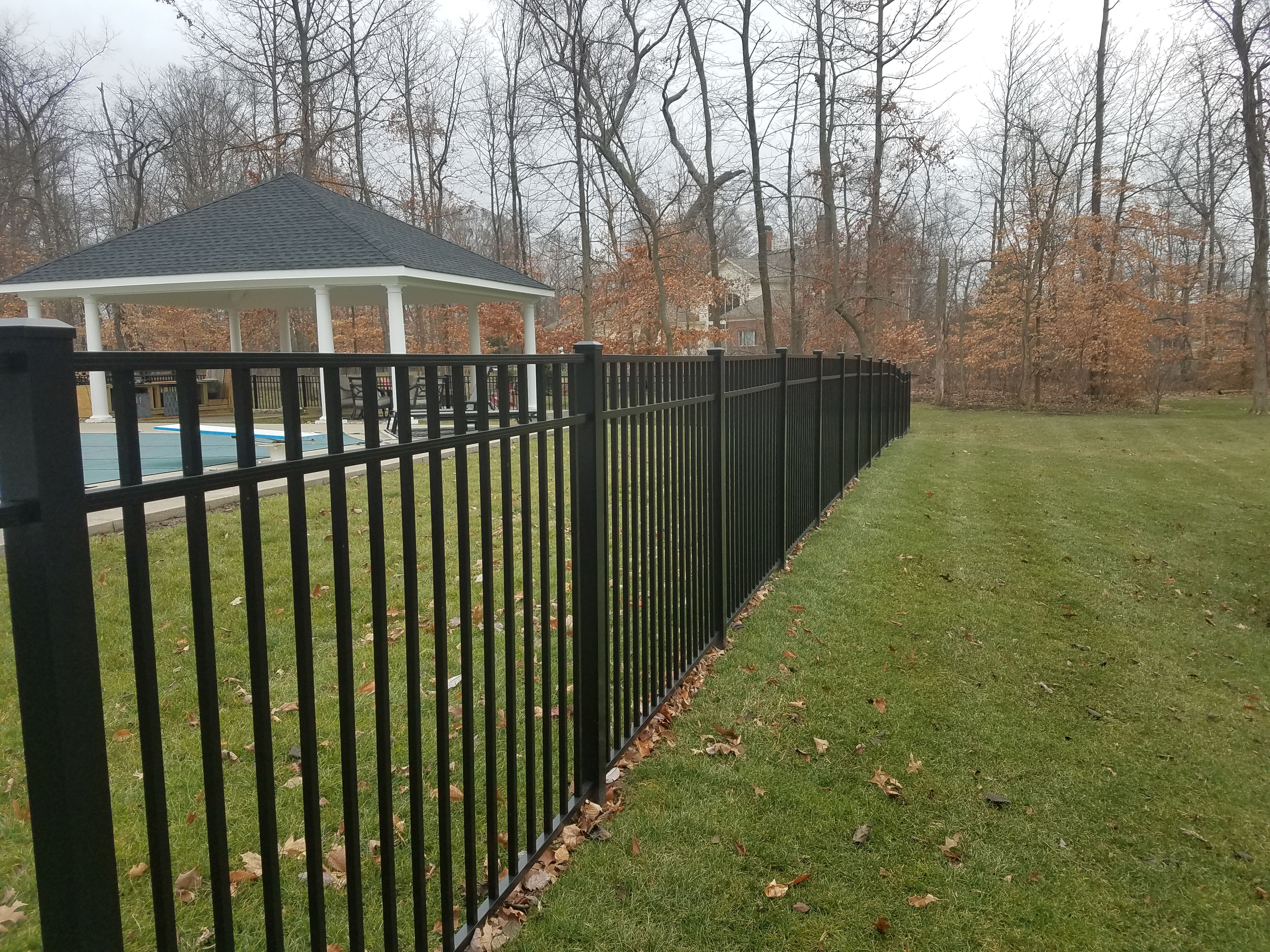 Ornamental black aluminum pool-code fencing installation in Columbus, OH.