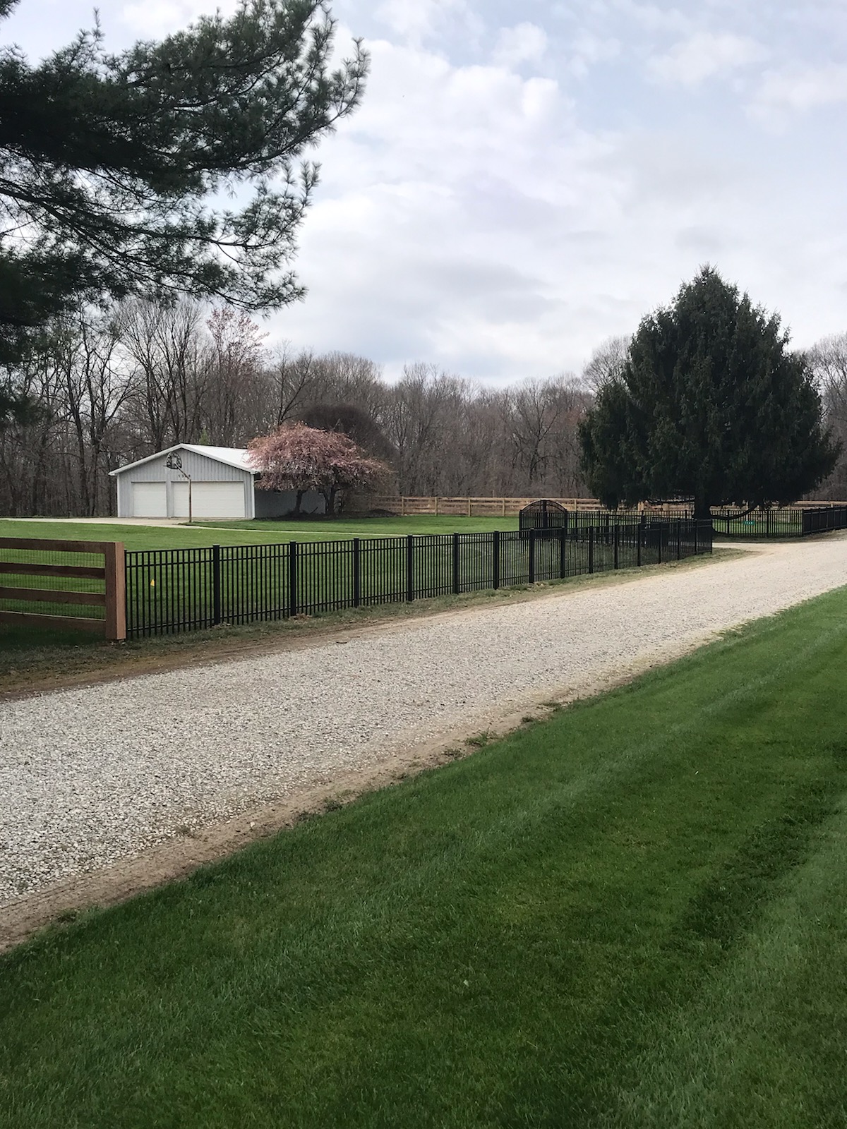 Custom arched ornamental aluminum backyard fence in Worthington, OH.
