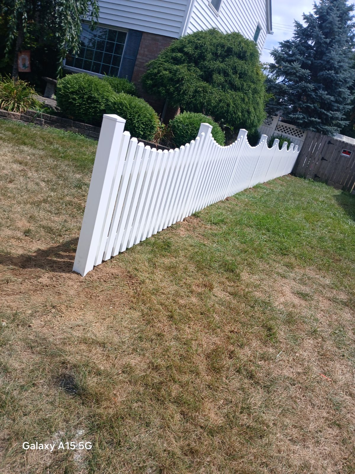 Custom vinyl double gate driveway system in Upper Arlington, OH.