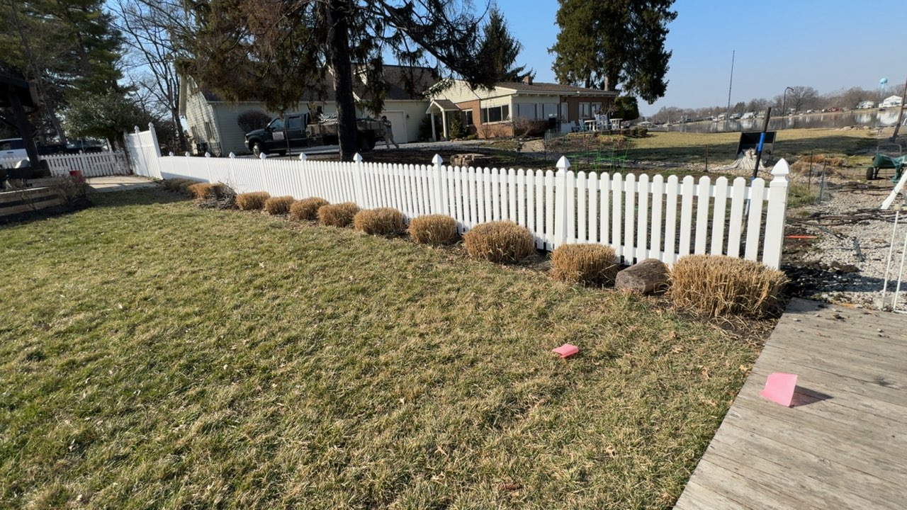 Wood-grain textured vinyl privacy fence in Bexley, OH.