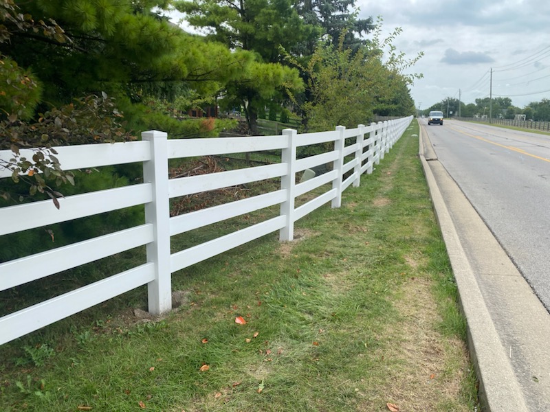 Premium vinyl privacy fencing for a residential yard in Granville, OH.