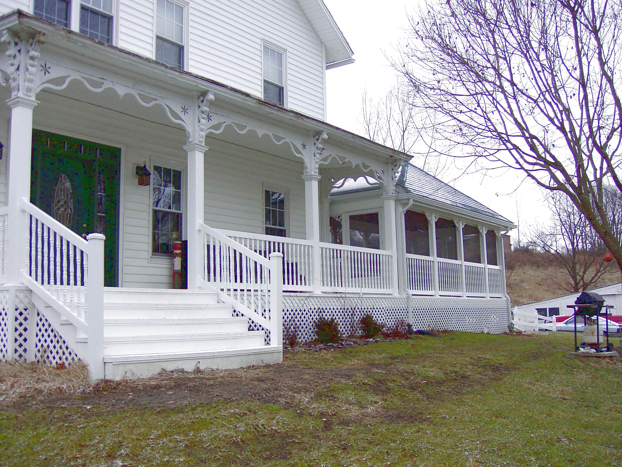 Poolside composite deck and railing enclosure in Granville, OH.