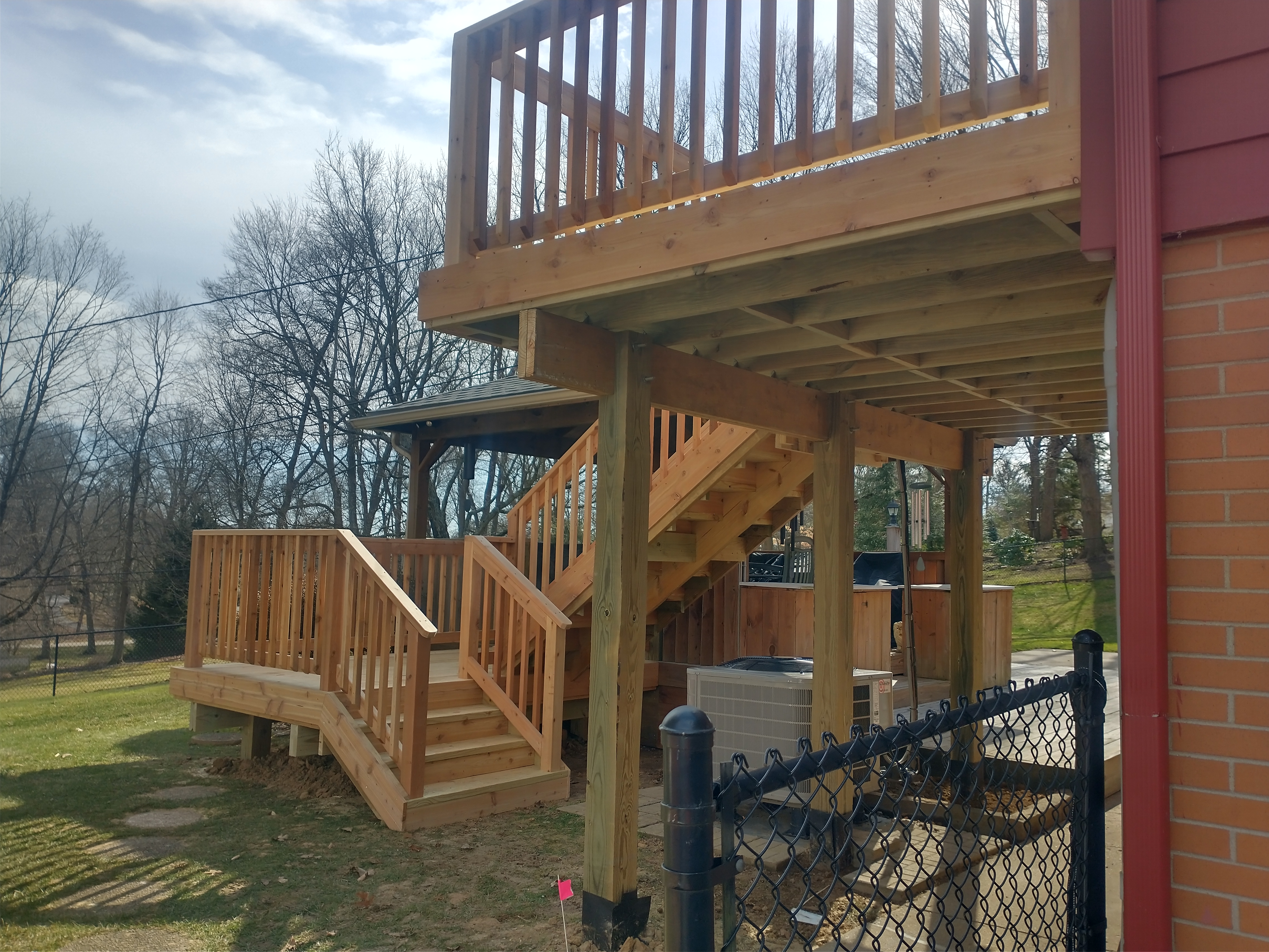 Custom composite deck installation with premium railing in Lancaster, OH.