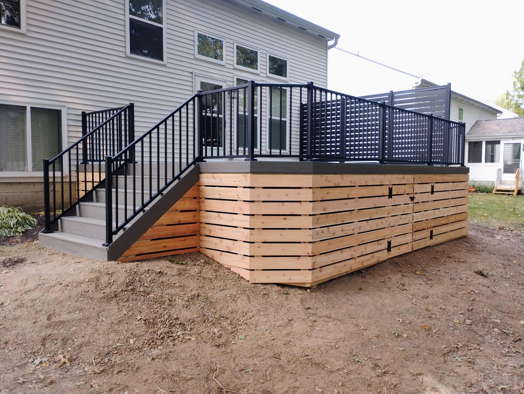 Backyard composite decking and railing upgrade in Grove City, OH.