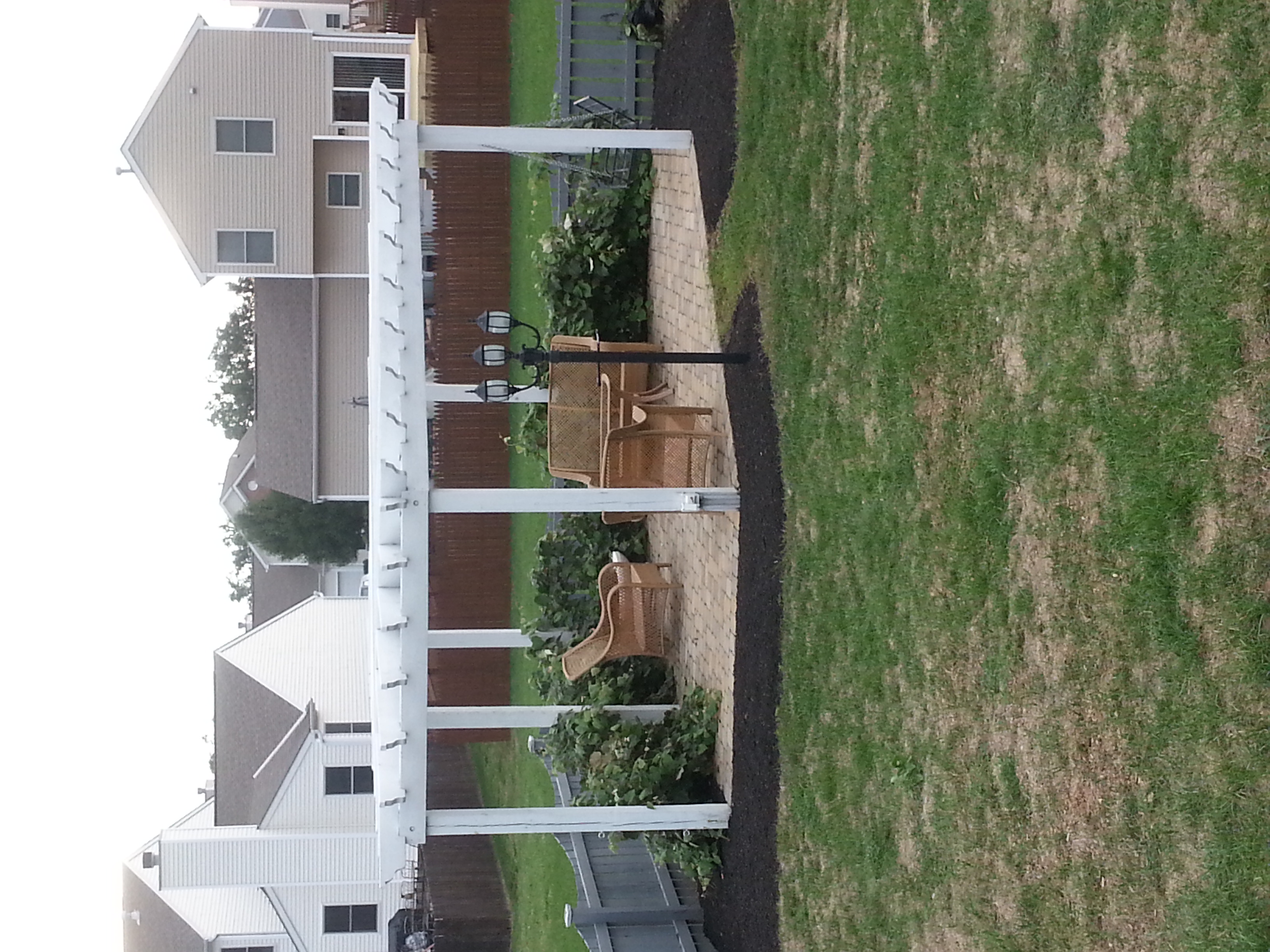 Heavy-duty timber pavilion sheltering an outdoor kitchen area in Marysville, OH.