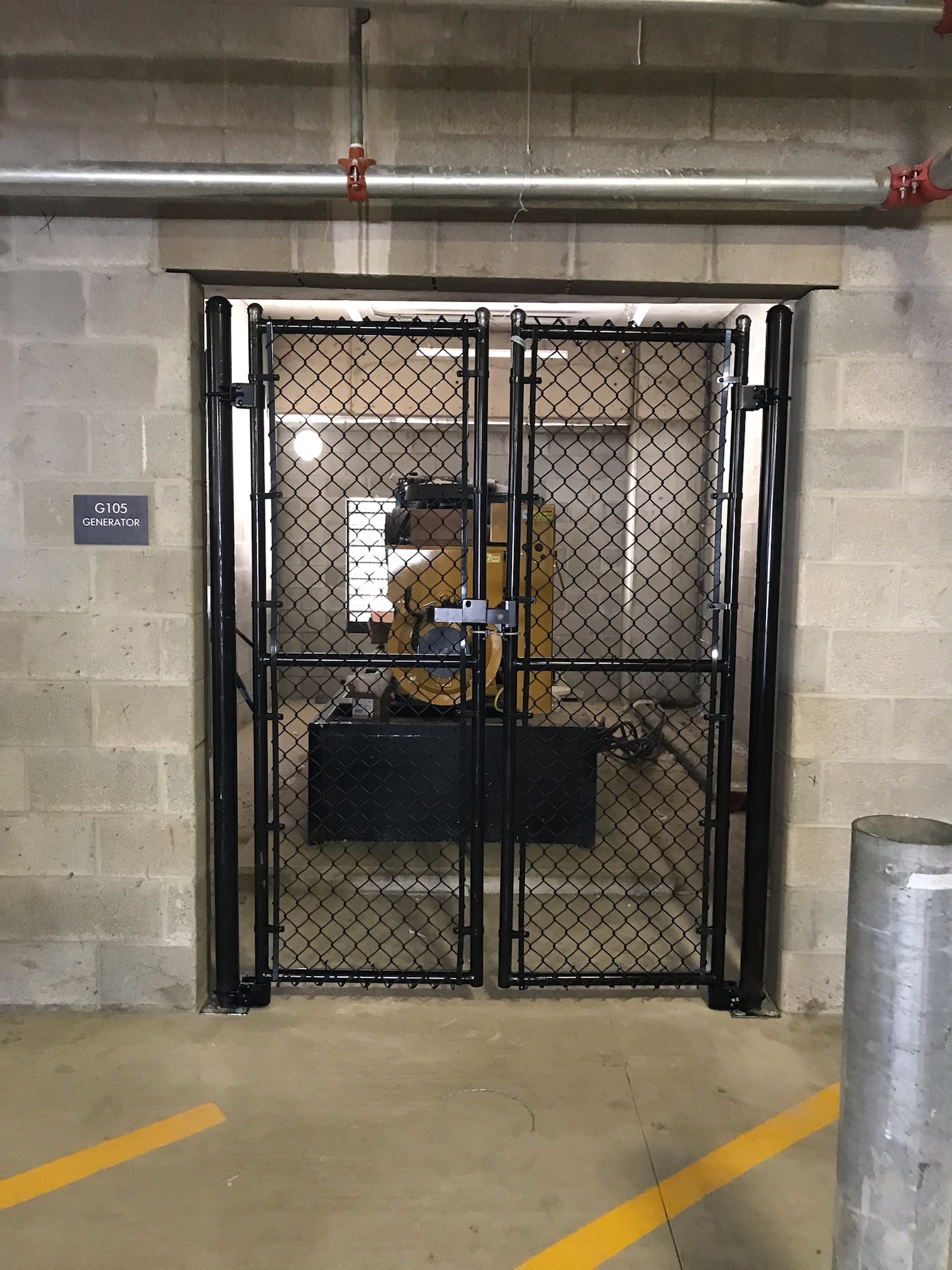Tall commercial security gate and fencing in Hilliard, OH.