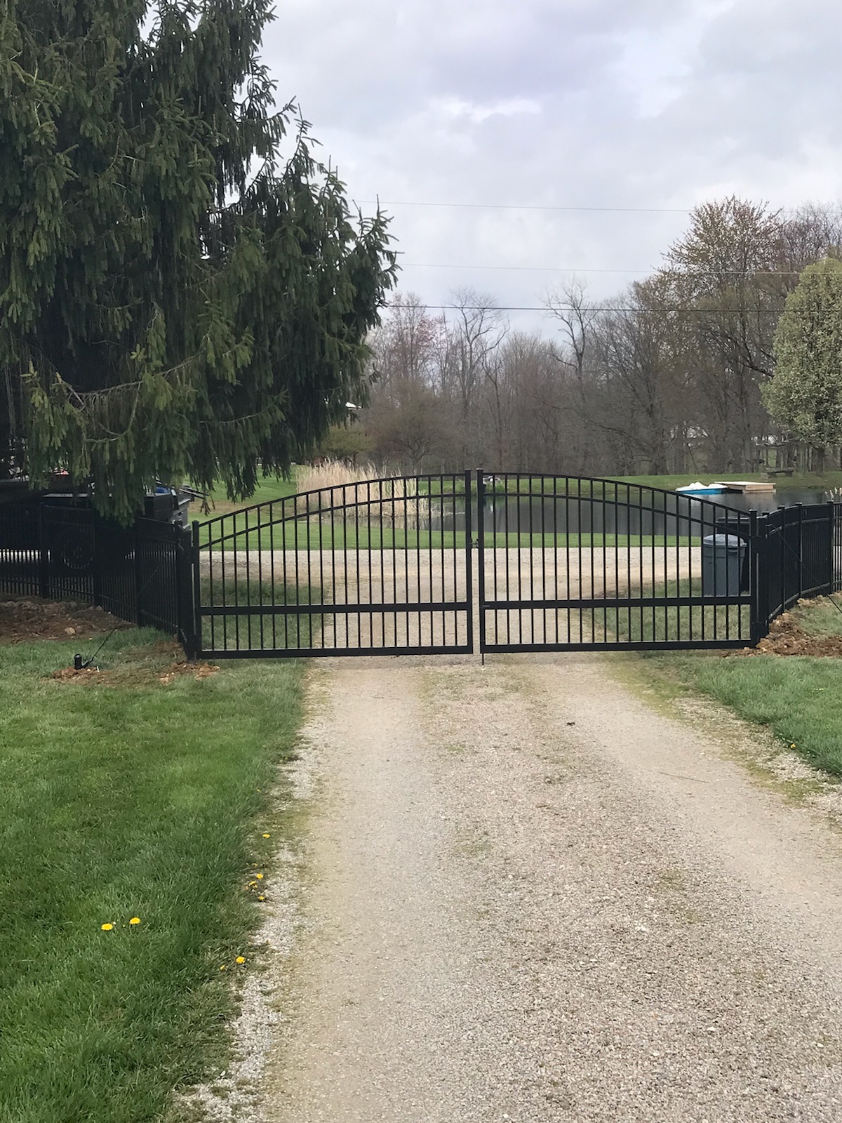 Ornamental iron-style custom gate installation in Newark, OH.