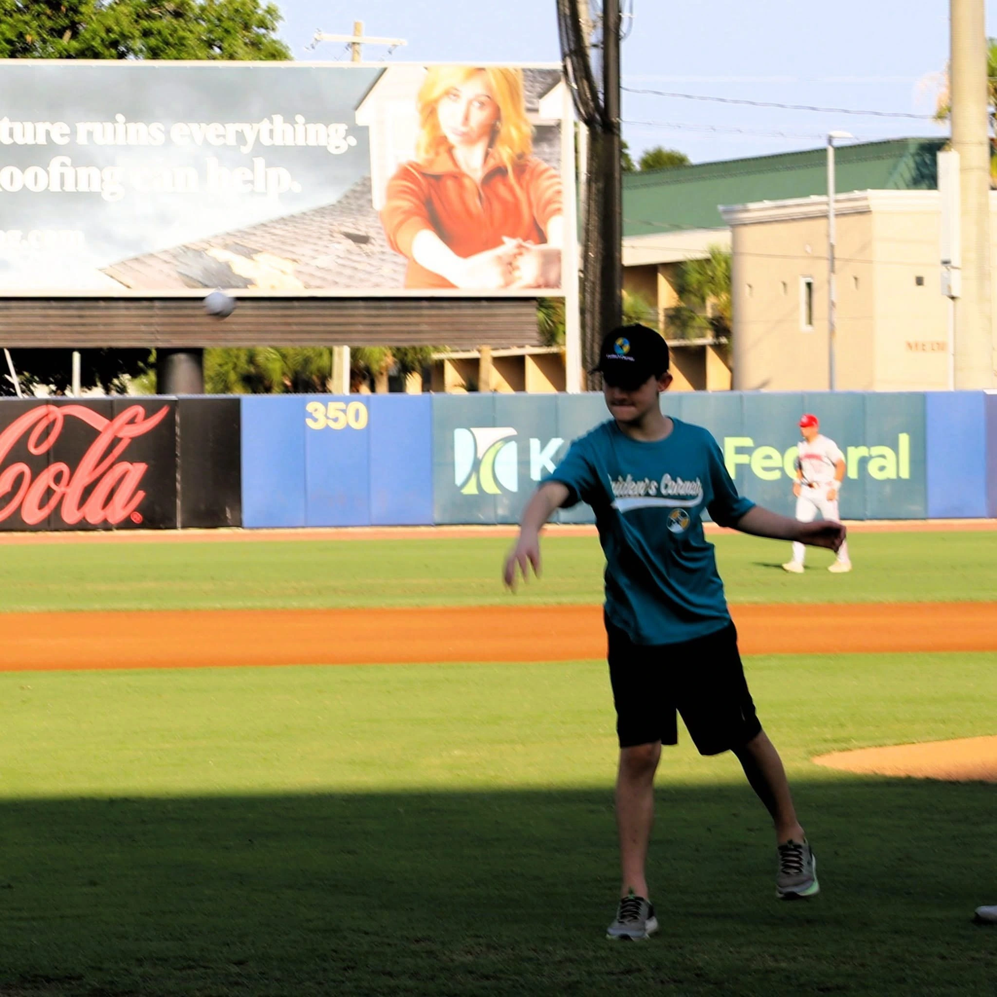 Caiden throwing the first pitch
