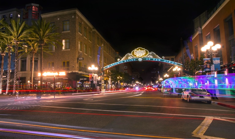 Night scene at San Diego's Gaslamp Quarter arch with vibrant lights and bustling nightlife. Night scene at San Diego's Gaslamp Quarter arch with vibrant lights and bustling nightlife.
