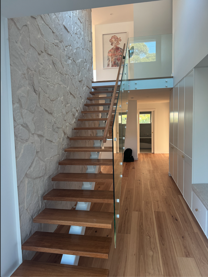 Finished stone cladding feature wall and staircase — Kiama Downs