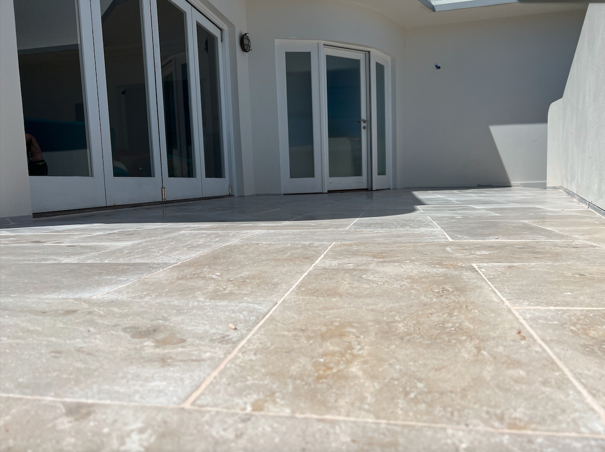 Front patio and staircase in 90-degree herringbone lay — Thirroul