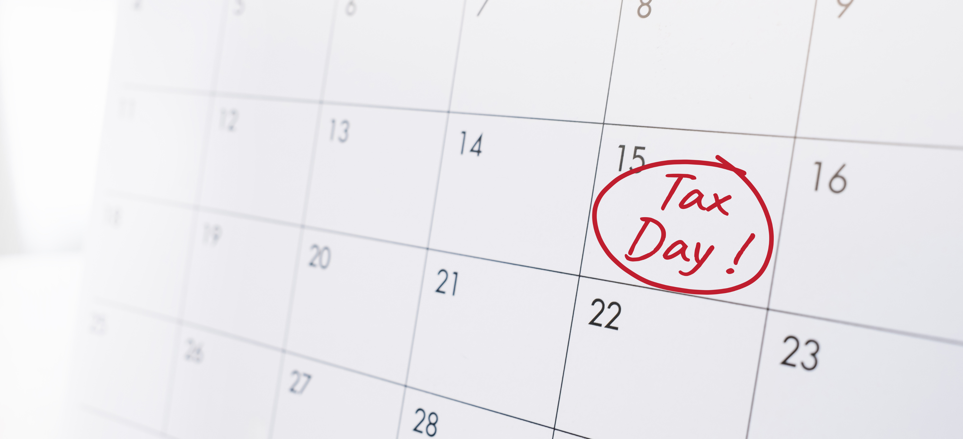 Calendar page with ‘Tax Day!’ circled in red, reminding law firm owners and attorneys of tax filing deadlines.