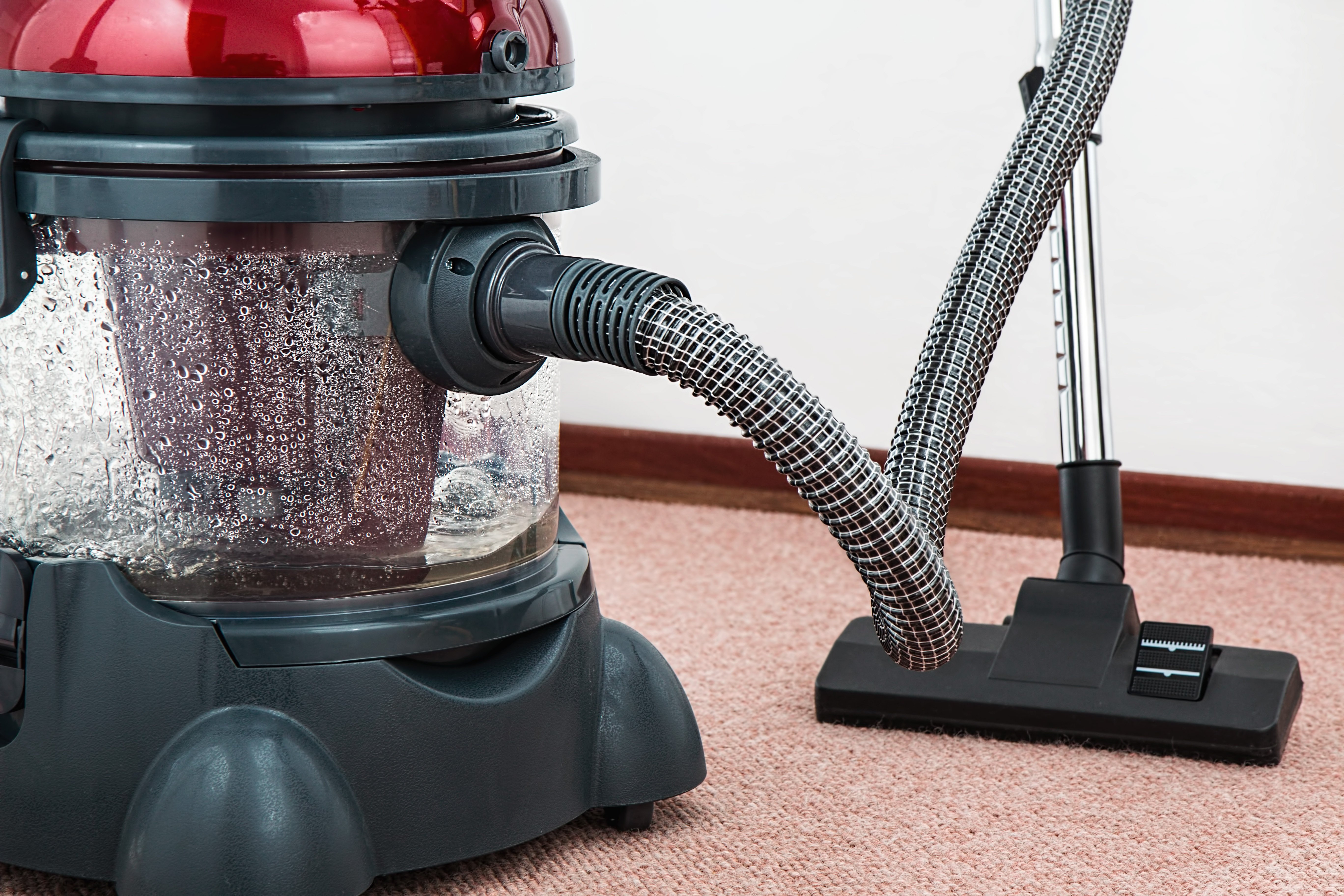 Vacuum with Rug Background