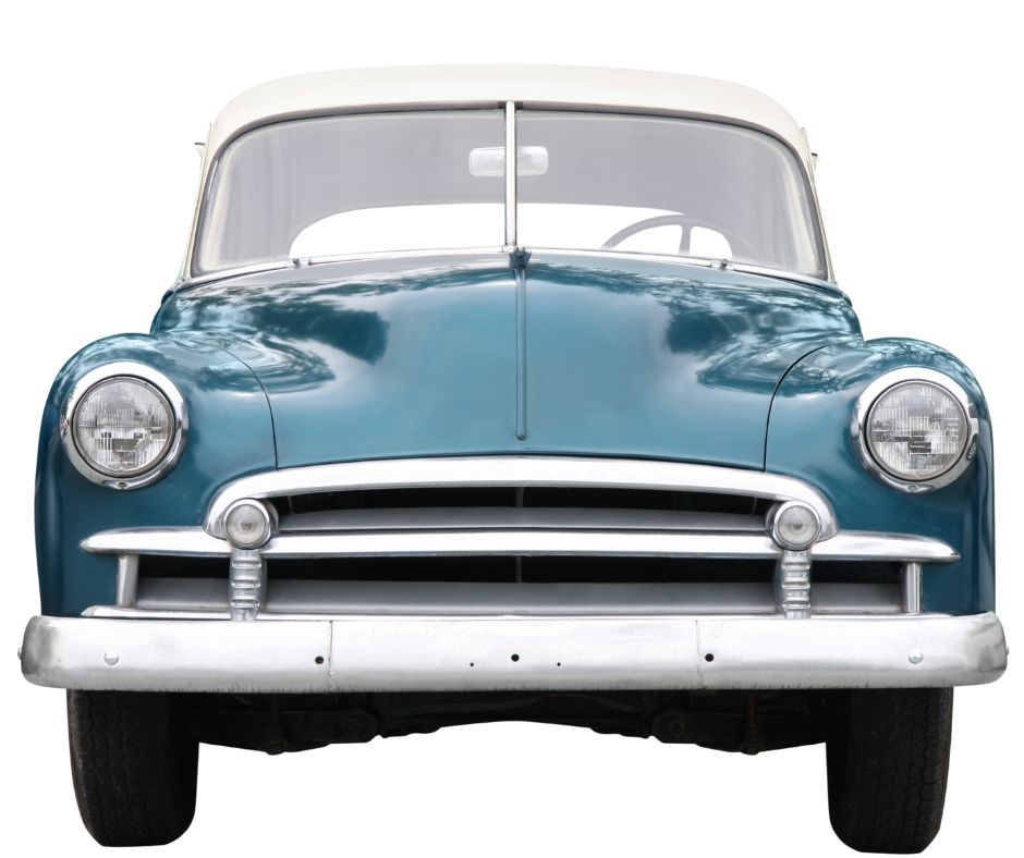 A vintage blue and white classic car with a rounded hood and chrome bumper, showcasing its retro design for Classic car registration. 