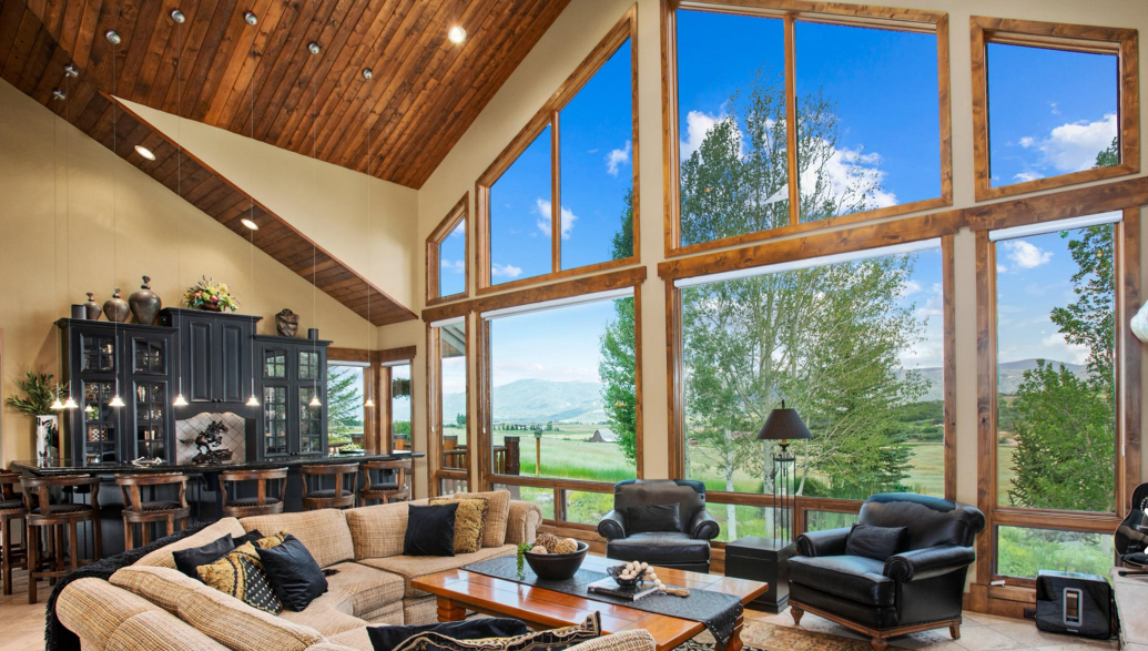 Great room with a twenty-foot gabled ceiling in a Steamboat Springs custom home