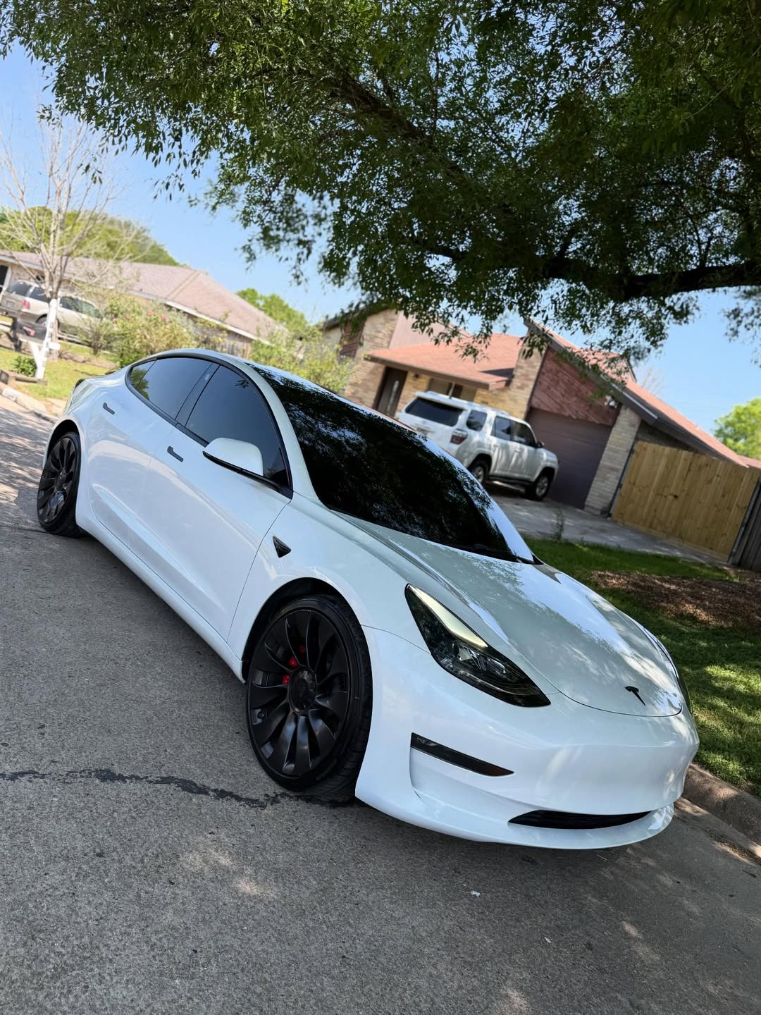 Exterior wash and ceramic coating on Tesla by 45 Detailing
