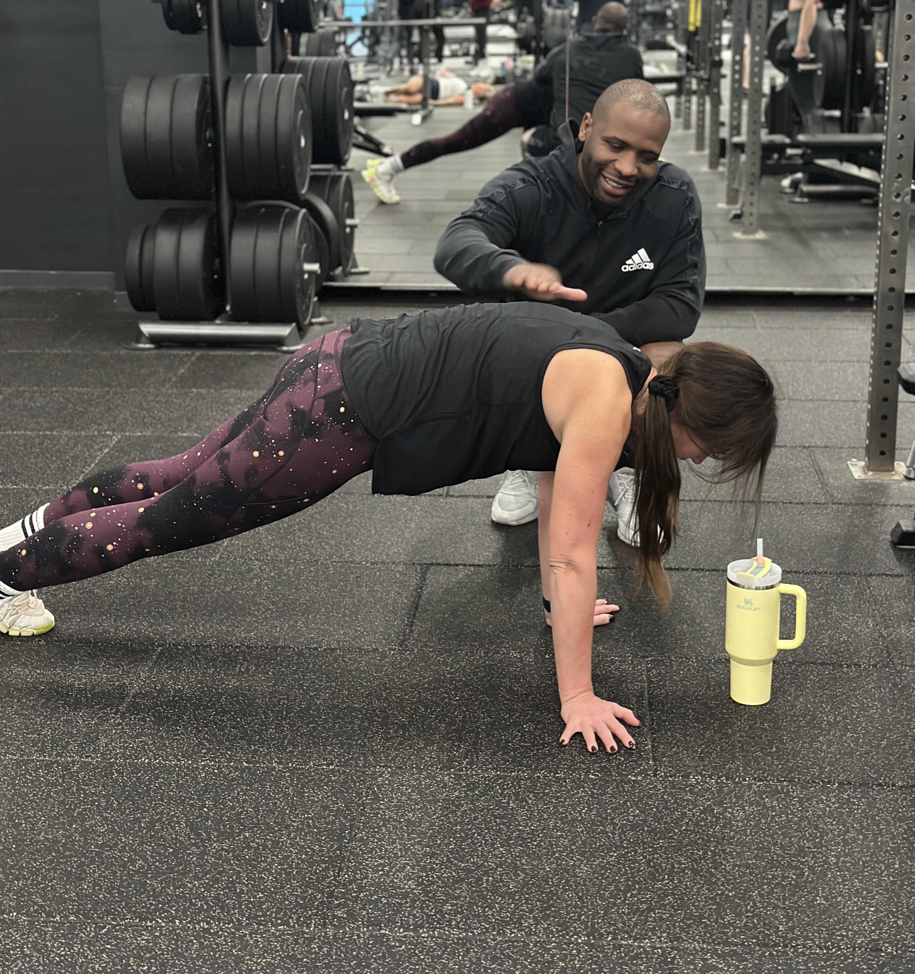 Renford Bennett coaching a client in the gym