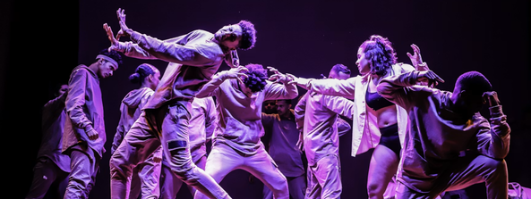 Dancers in an energetic hip-hop and musical theatre class