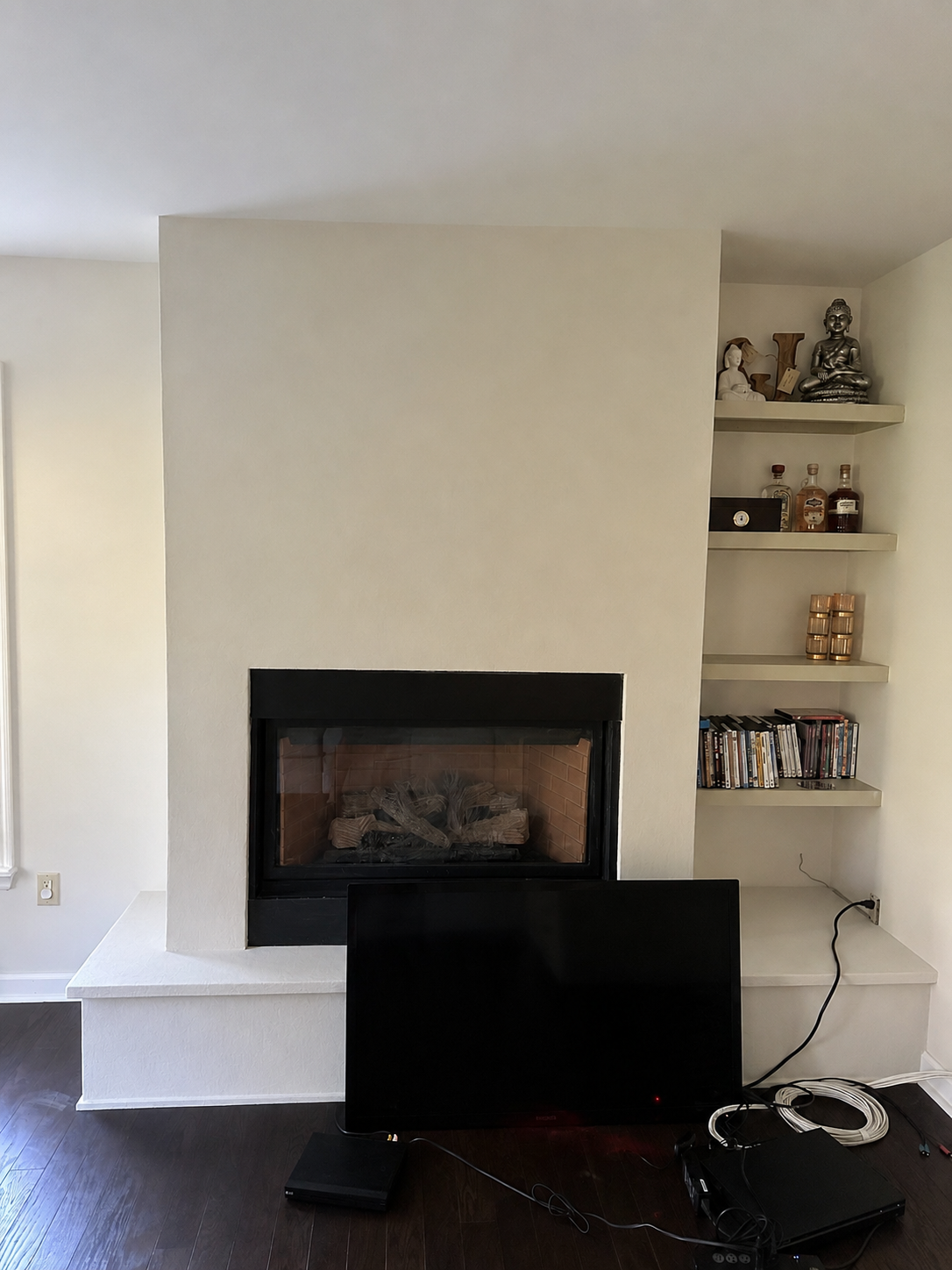 Cream white Roman clay fireplace finish living room Central Florida - Protocol Home Services