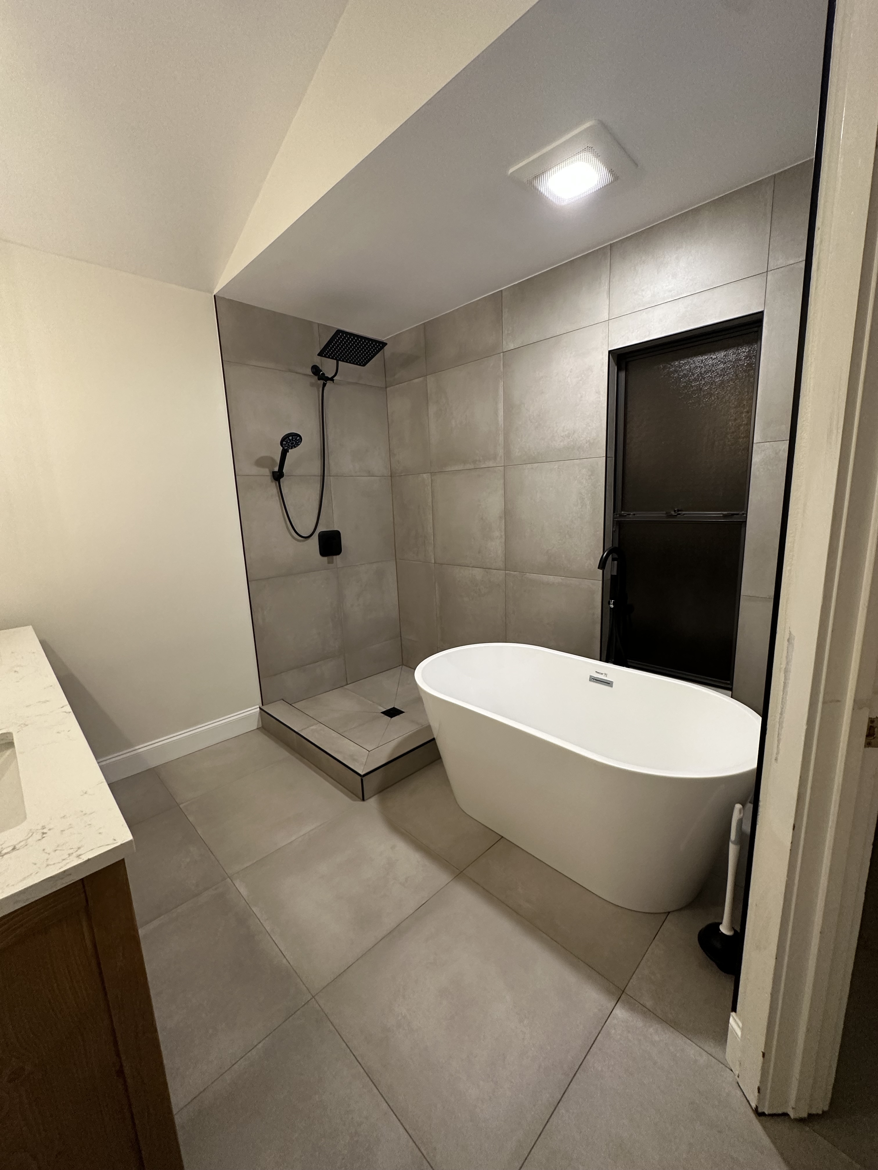 Updated bathroom tile remodel shower Central Florida - Protocol Home Services