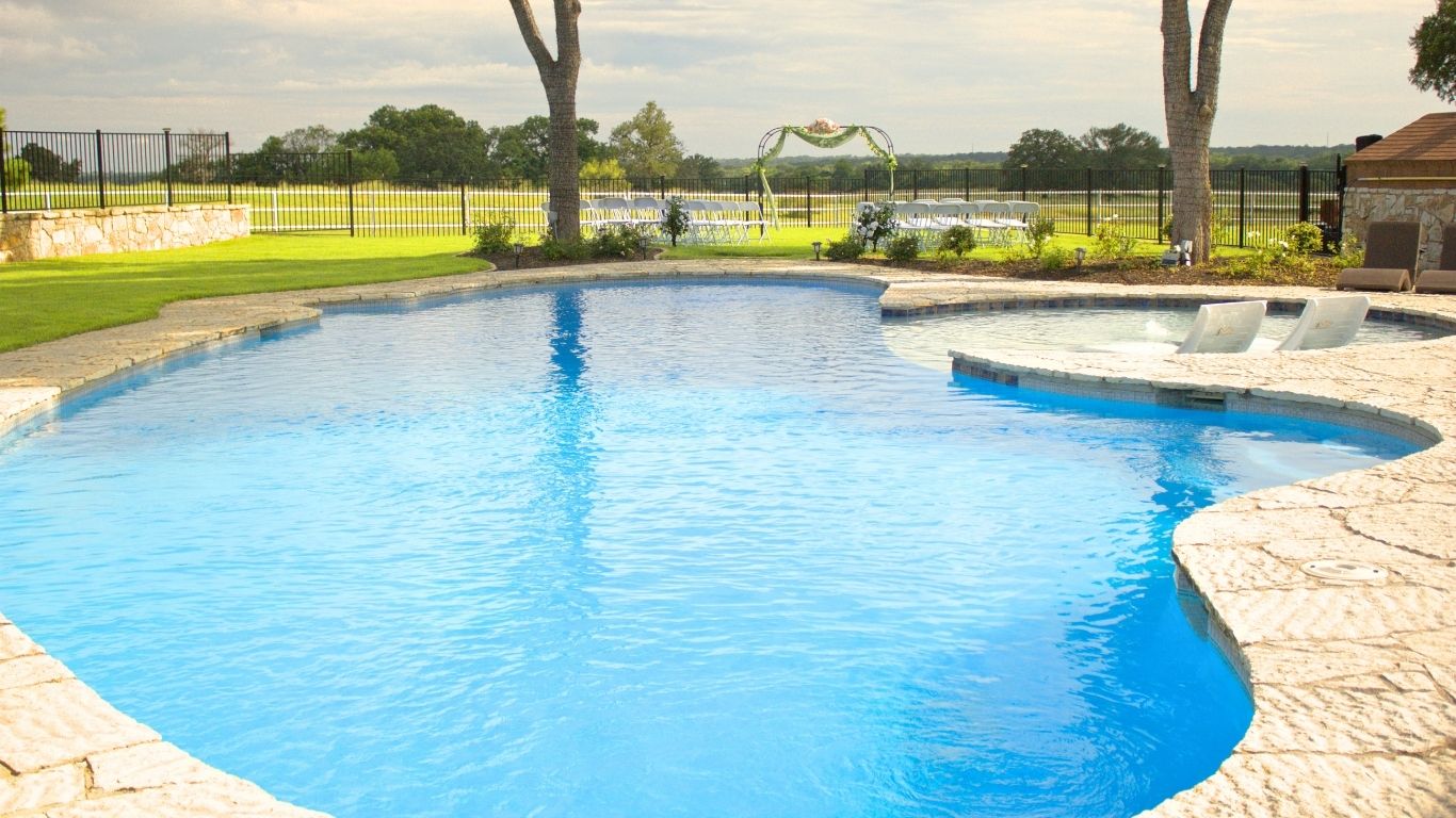 Poolside view photographed at a Central Texas ranch event venue