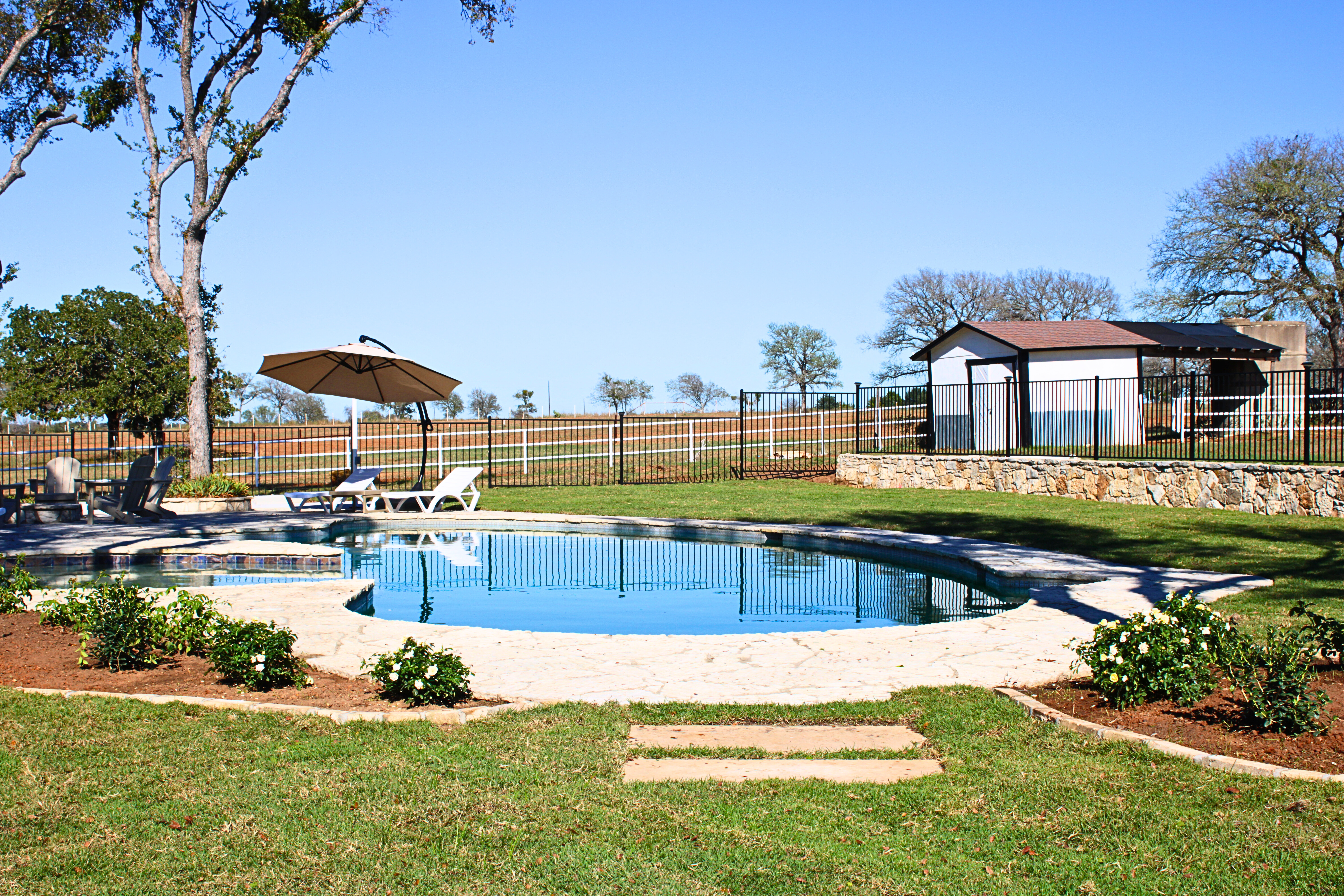 Pool and patio area photographed for a Central Texas event venue gallery