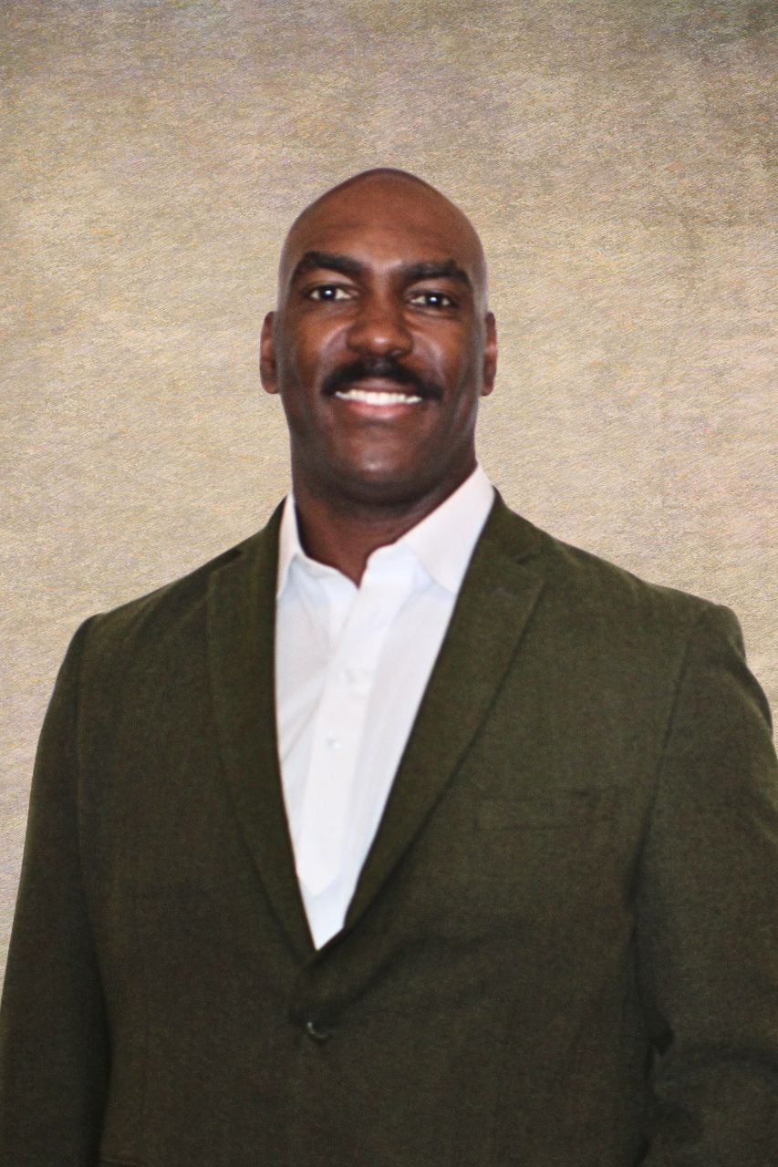 Professional business headshot photographed in a Lockhart, Texas studio