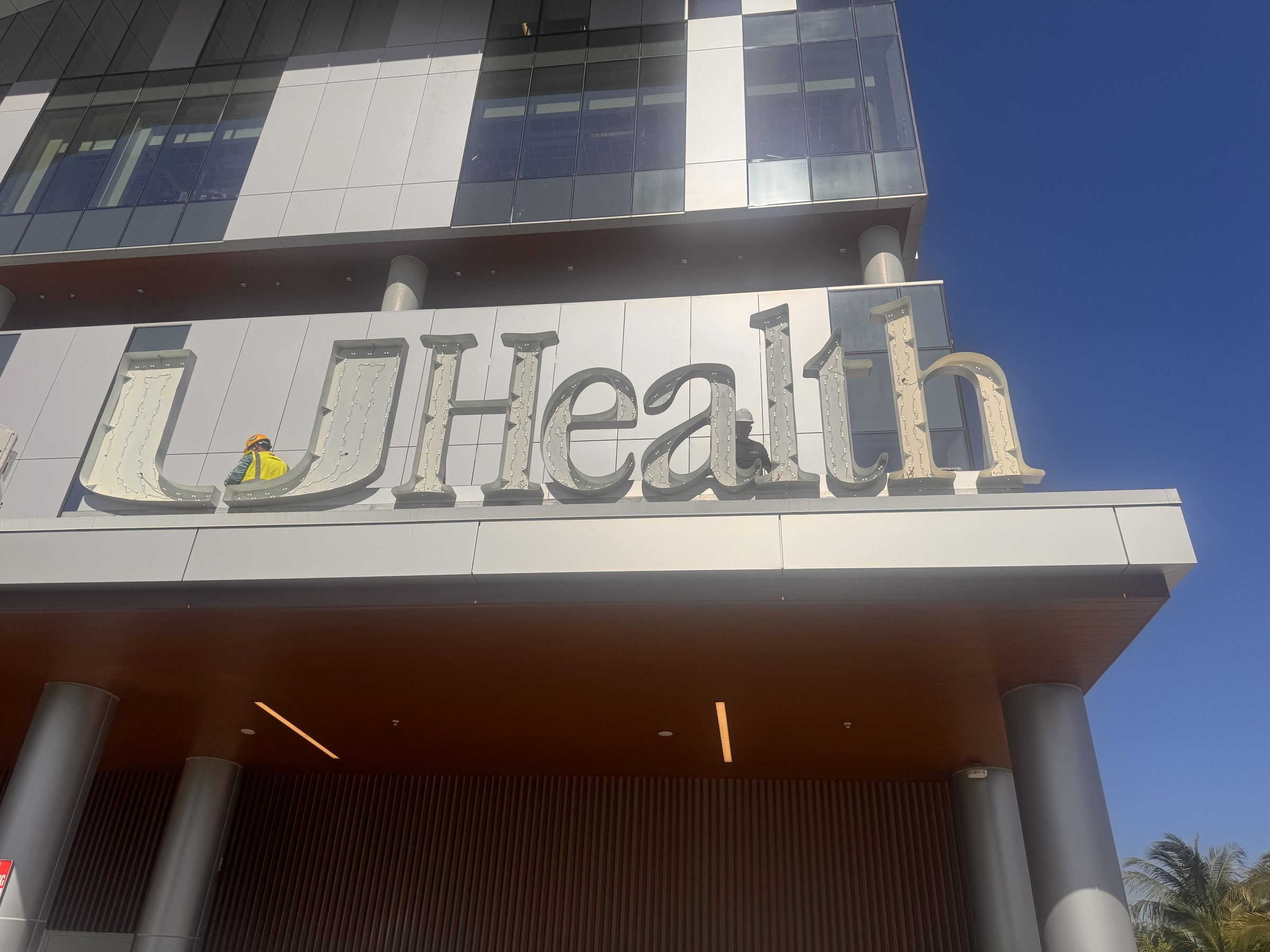 Custom illuminated channel letters on a medical building in North Miami installed by Corporate Signs