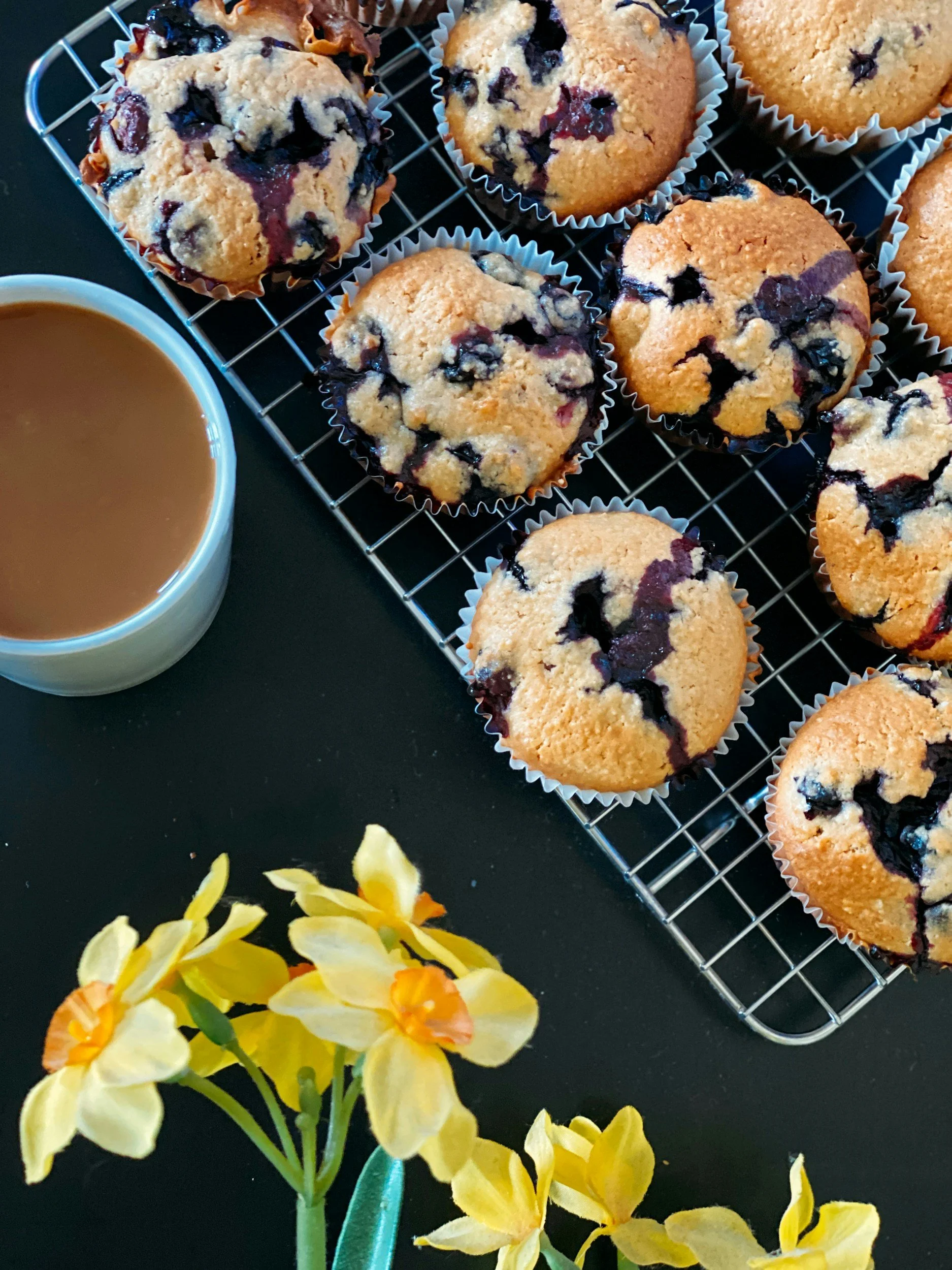 Blood sugar friendly blueberry muffins on a cooling rack — gluten-free recipe by Dr. K of Navigate Wellness