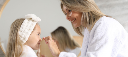 Mom and daughter in bathrobes