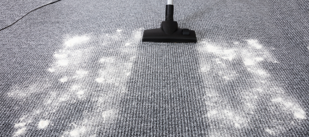 vacuuming carpet