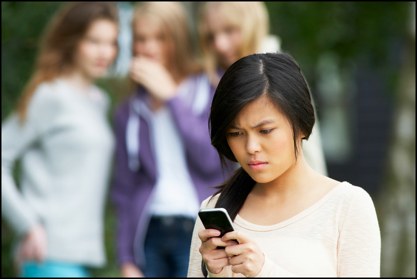 Teen girl being excluded and cyberbullied