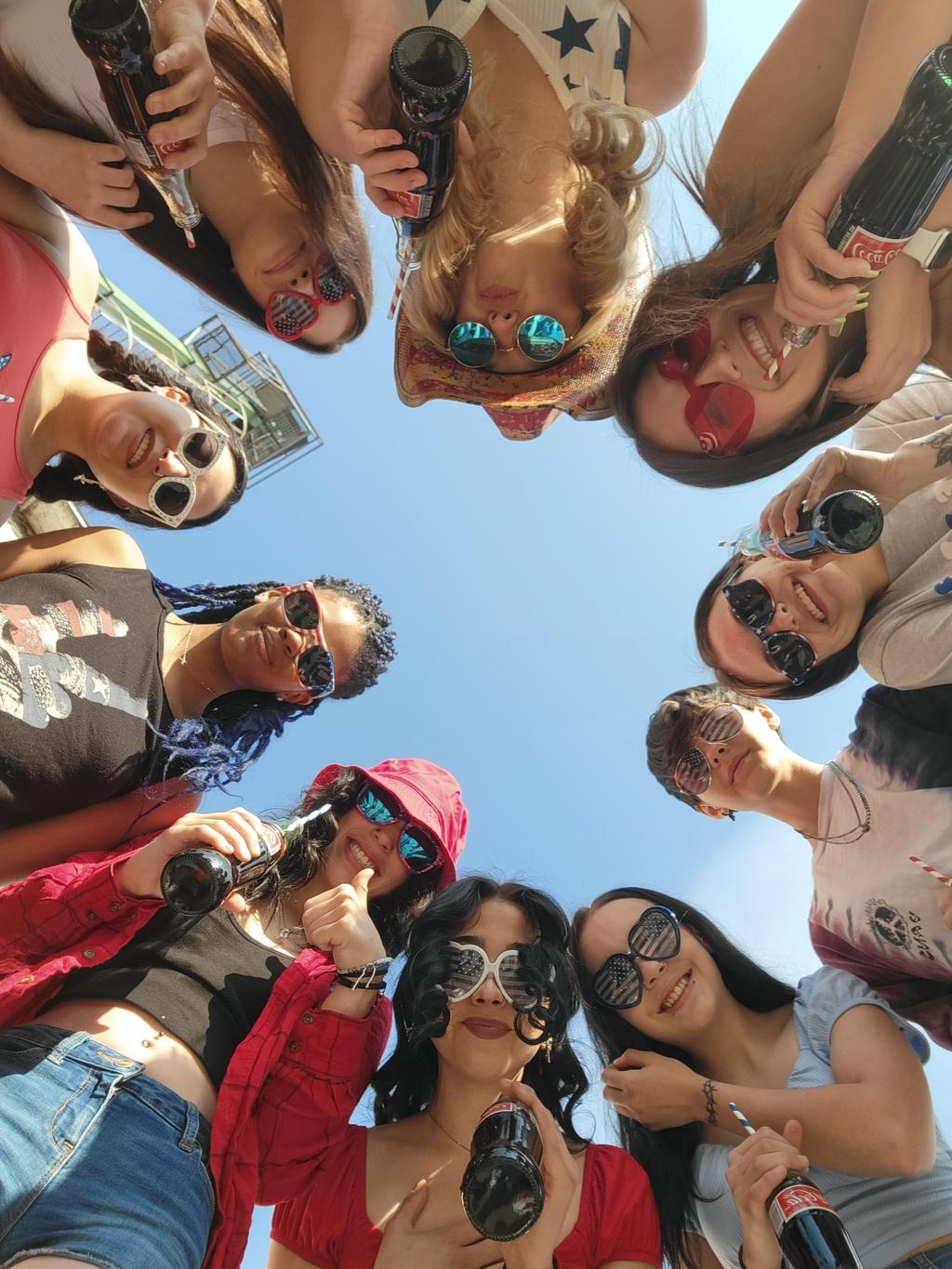 Carols Crew high school rep team girl holding rainbow lollipop johnstown colorado