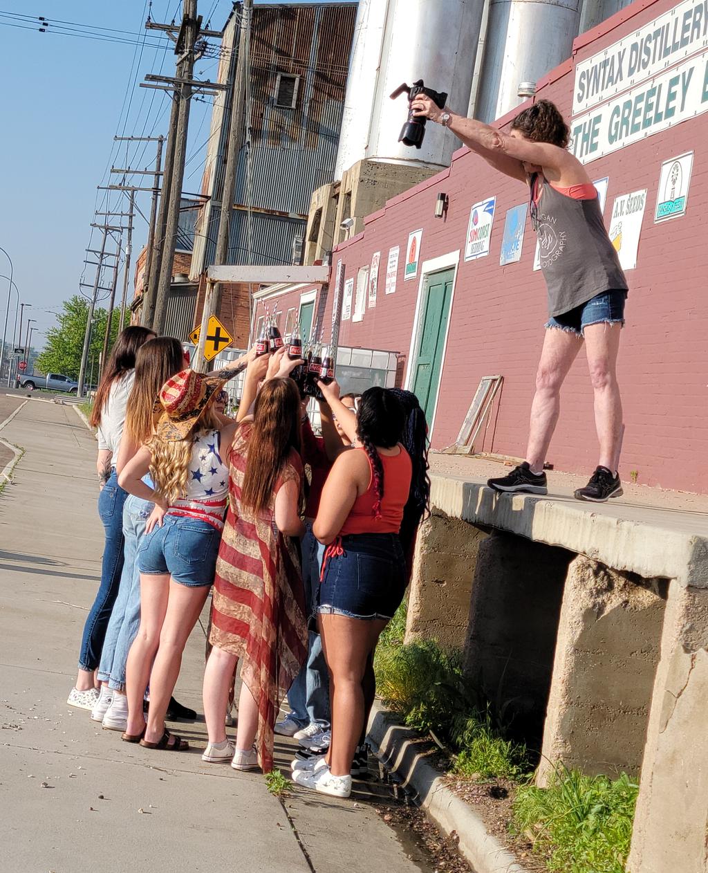 Carols Crew high school model team taking selfie together styled shoot greeley colorado
