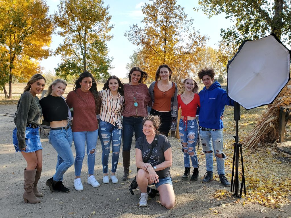 Carols Crew senior model team girls in New Years hats celebration styled shoot loveland colorado
