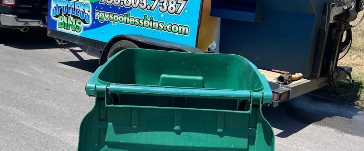 Trash bin cleaning equipment labeled sanitize disinfect deodorize for waste container sanitation