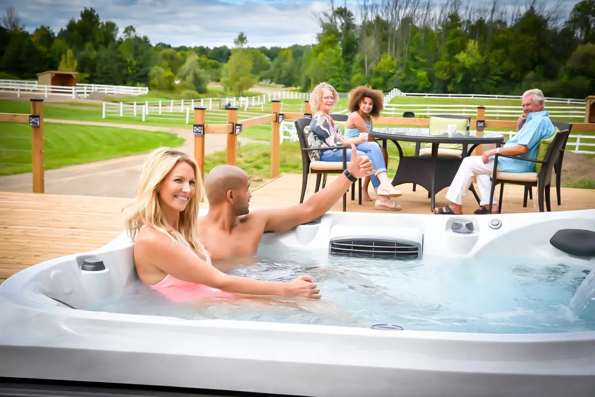 family enjoy jacuzzi hot tub