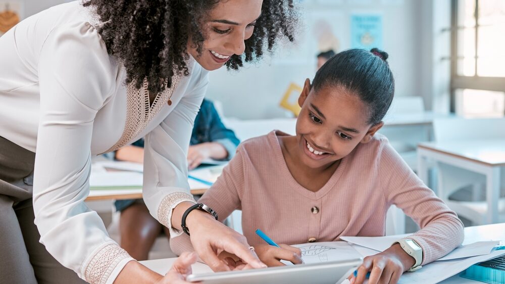 Mentor guiding a student one-on-one