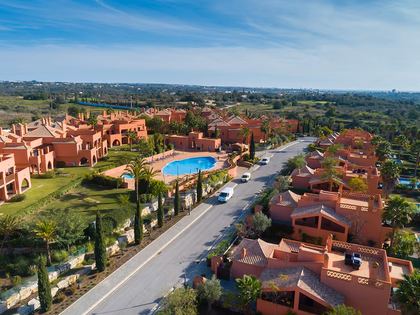 Accommodation and pool at Amendoeira Golf Resort