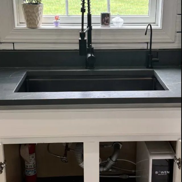 Kitchen sink with dedicated drinking water faucet and under-sink system