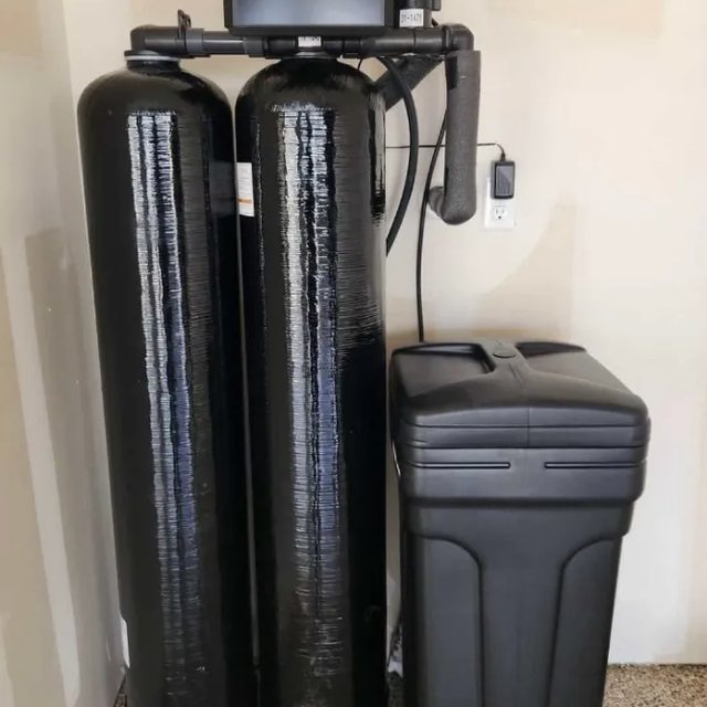 Bowen Water Co dual-tank whole-home system installed with brine tank