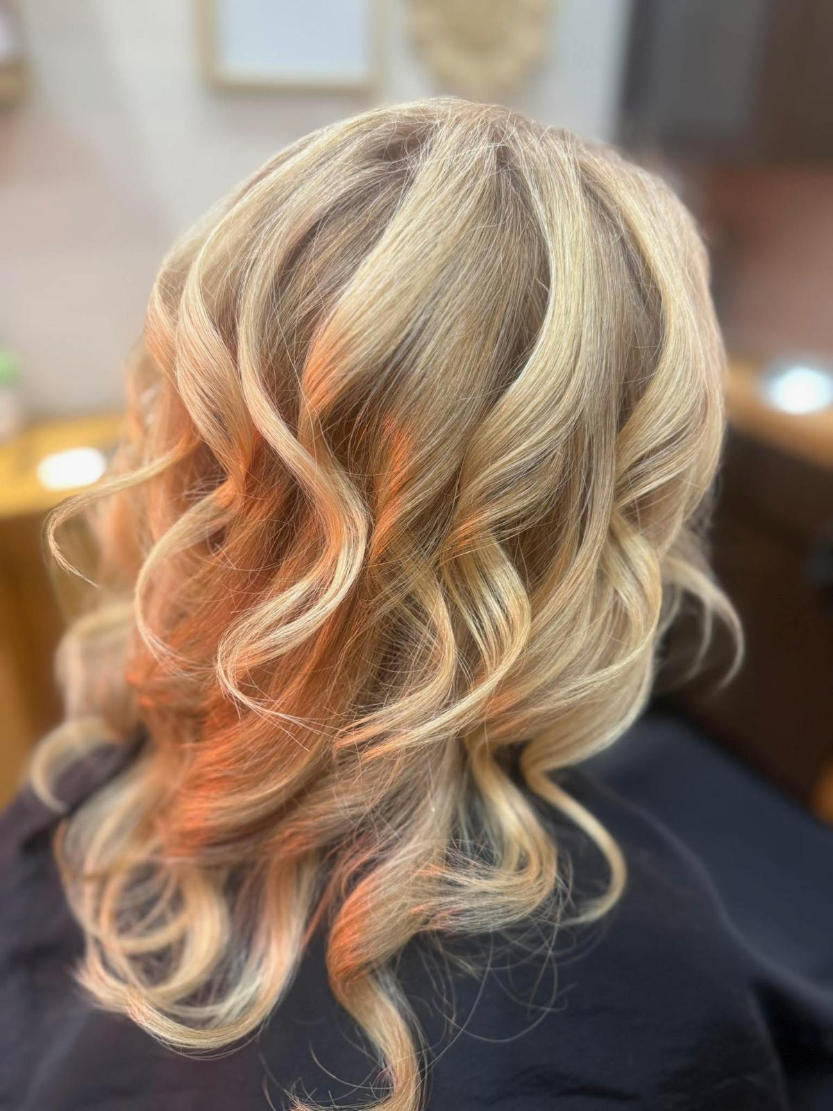 Hair color and styling work by Tiffany Greely