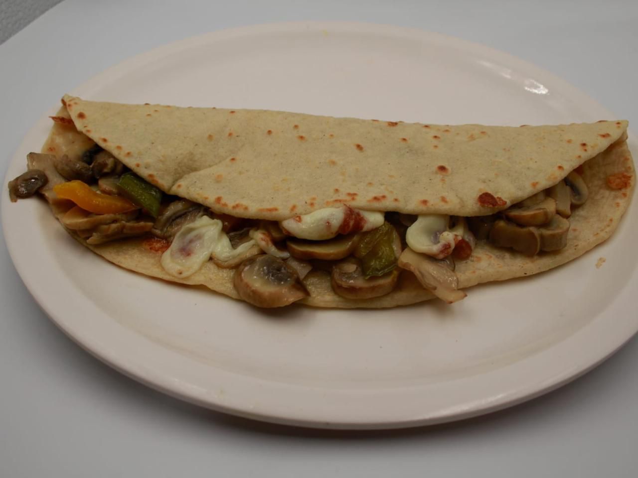Taco de guiso con champiñones