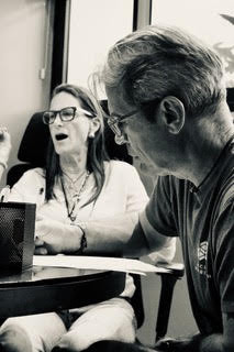 Todd Vincent in conversation with a client over project plans