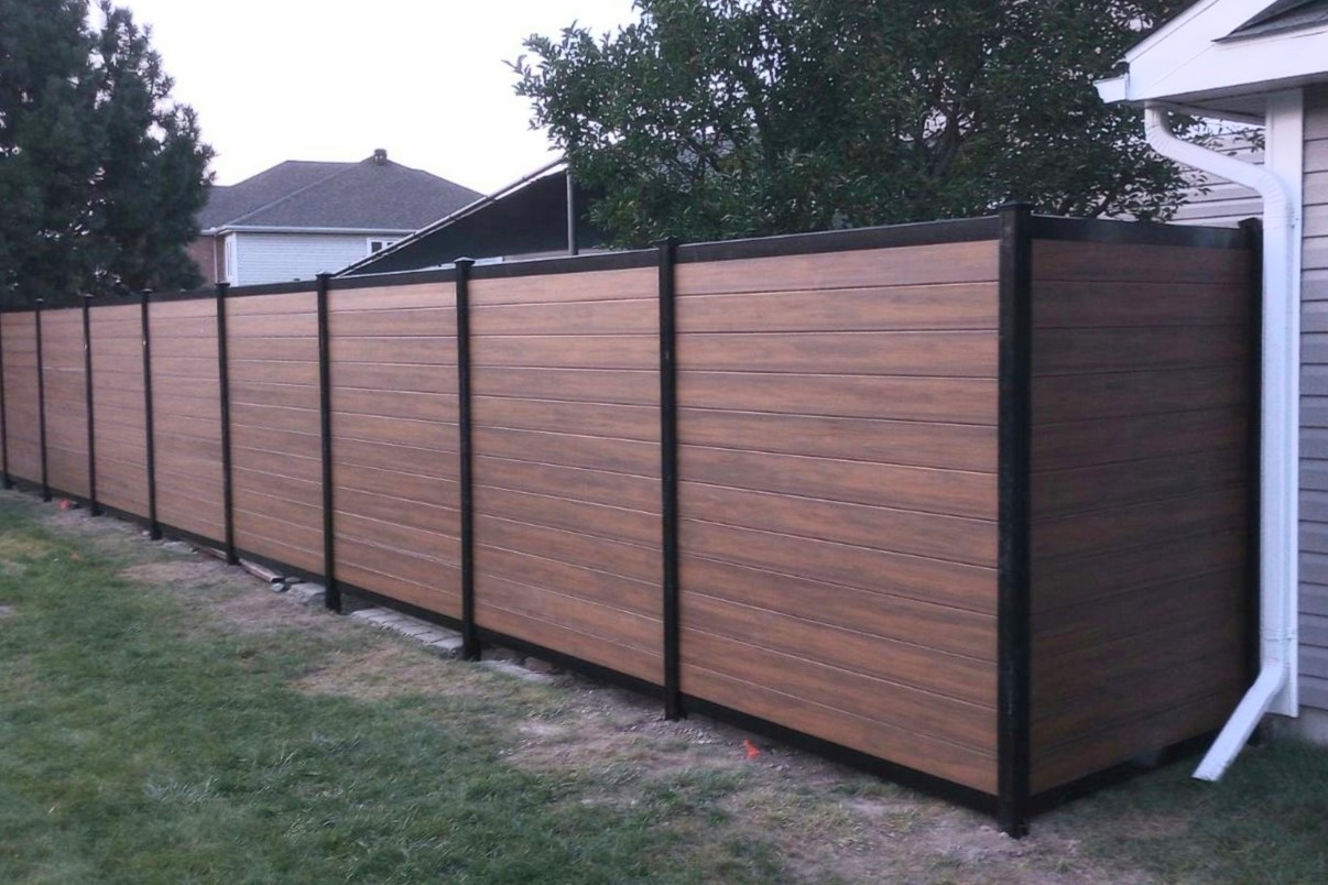Durable hybrid backyard fence project in Embrun