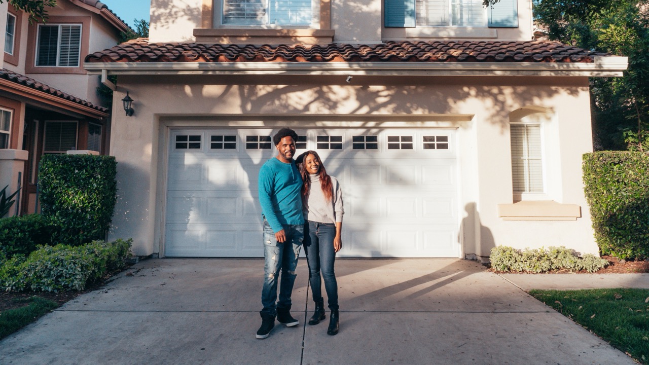 Couple Outside Home