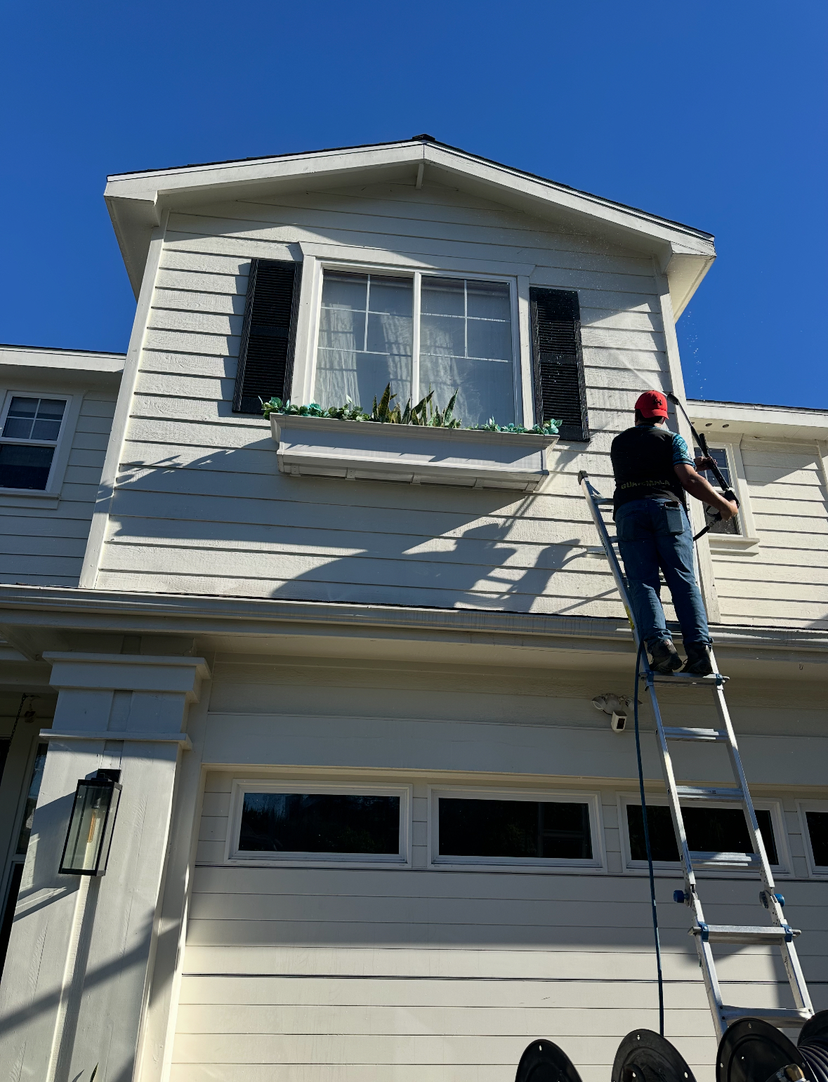 Polar Wash Co. crew outside a freshly washed Skagit County home