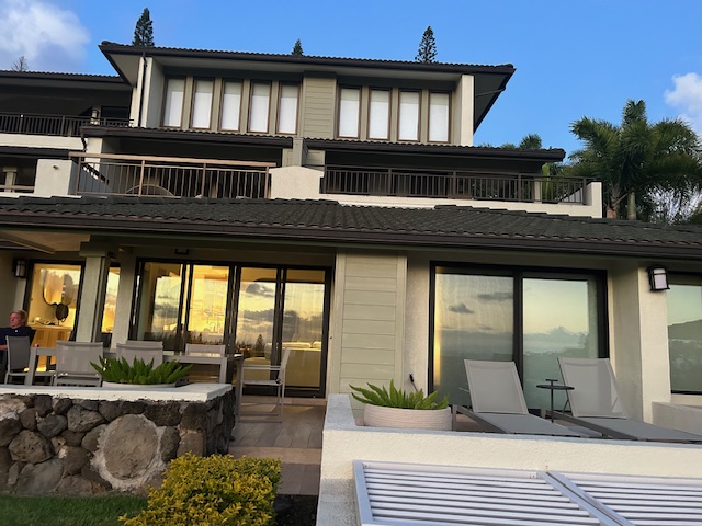 Building exterior at dusk with warm glow
