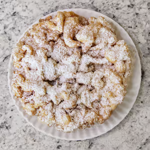 Fresh funnel cakes with powdered sugar at Hungry Viking Fenwick Island