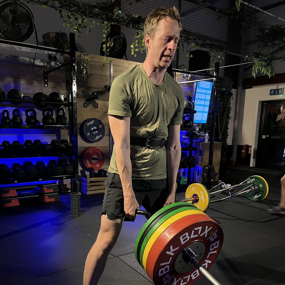 Member lifting a trap bar at DMF Evolve